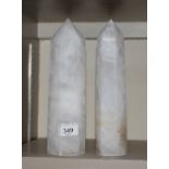 A pair of decorative crystal obelisks, 24cm high