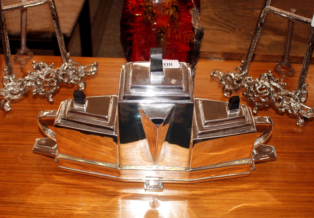 A plated Art Deco style three section tea set
