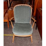 A pair of Ercol stick back cottage armchairs