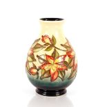 A Moorcroft "Rhododendron" pattern baluster vase d
