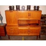 A G-plan teak wall unit, the upper section with