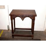 A late 19th / Early 20th Century carved oak occasi