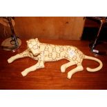 A designer leopard sculpture, 57cm long