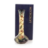 A Moorcroft floral decorated slender neck vase, 20