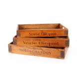 A set of three wooden Champagne trays
