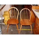 A set of four Ercol stick back dining chairs and another similar, AF