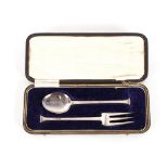 A silver seal end Christening fork and spoon, Shef