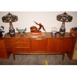 A teak G-plan design long sideboard fitted with a