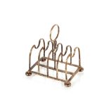 A silver four division toast rack, Chester 1925