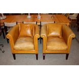 A pair of Laura Ashley, tan leather upholstered tu
