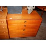 A teak G-plan chest fitted four long graduated dra