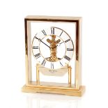 A Rhythm Quartz mantle clock, 21cm