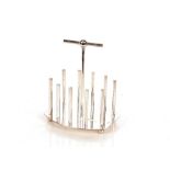 A silver plated toast rack, in the manner of Dr Christopher Dress