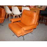 A pair of 1970's chrome and brown leather swivel e