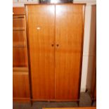 A pair of Vesper mid-20th Century wardrobes in the