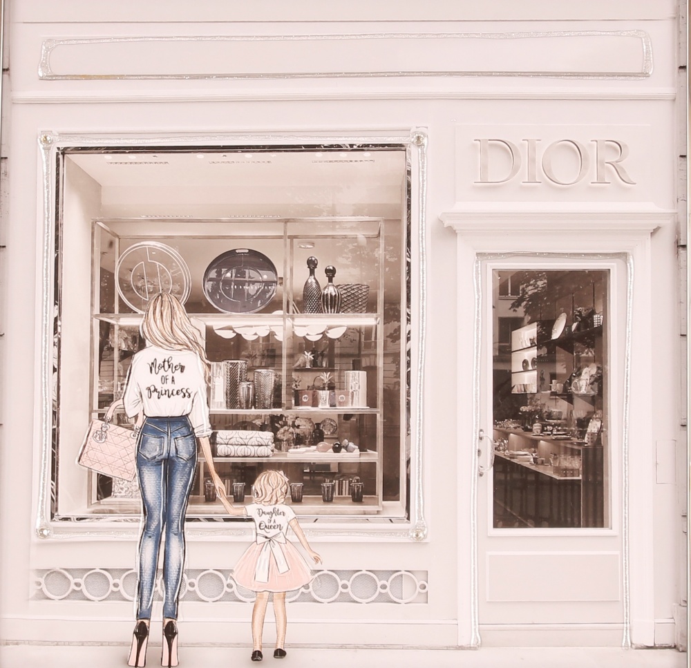 A decorative Dior shop window picture, with mirro