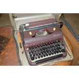 An Olympia typewriter in fitted case