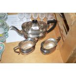 A silver plated tea set comprising of teapot, suga