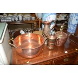 A large copper and brass preserve pan together wit