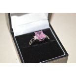 A boxed 925 ring set with square cut pink stone