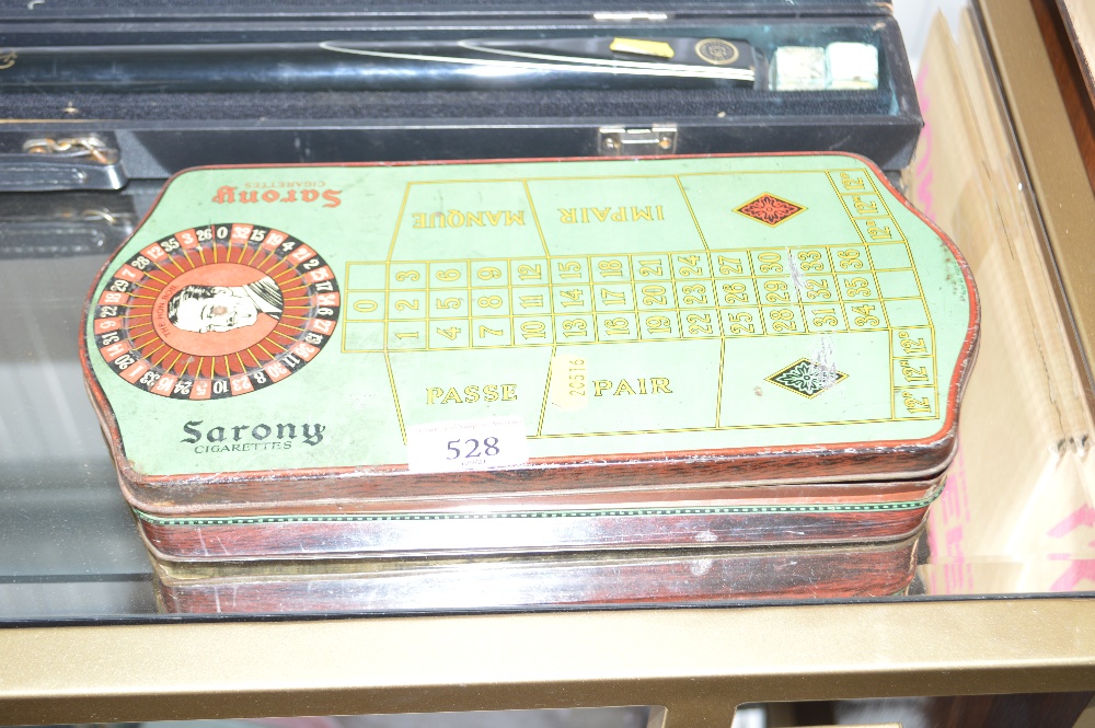 A Sarony Cigarettes games tin