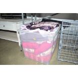 A box containing velvet cushion covers; cushions;