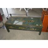 A green gilt and floral decorated oriental table f