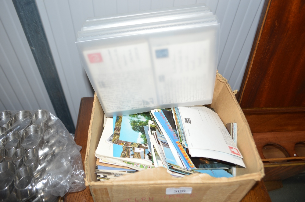 A box of various modern post-cards