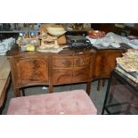 A two drawer walnut sideboard