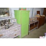 A green painted pine cupboard