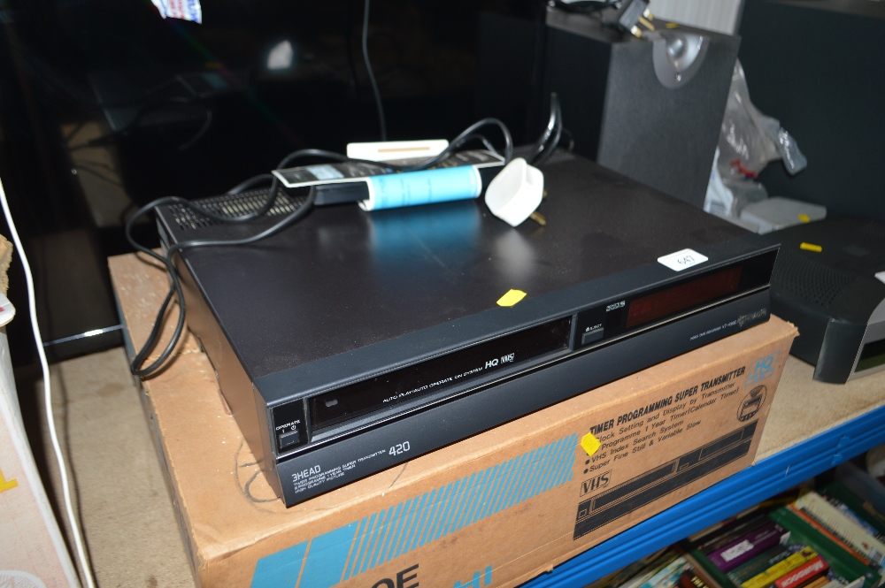 A Hitachi video tape recorder / player