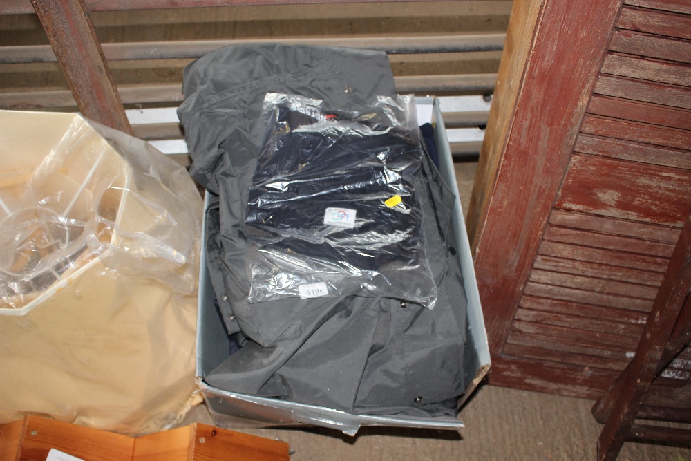 A box of waterproof clothing etc.