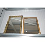 Two oblong wall mirrors