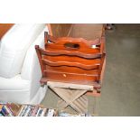 A folding hardwood table and a magazine rack