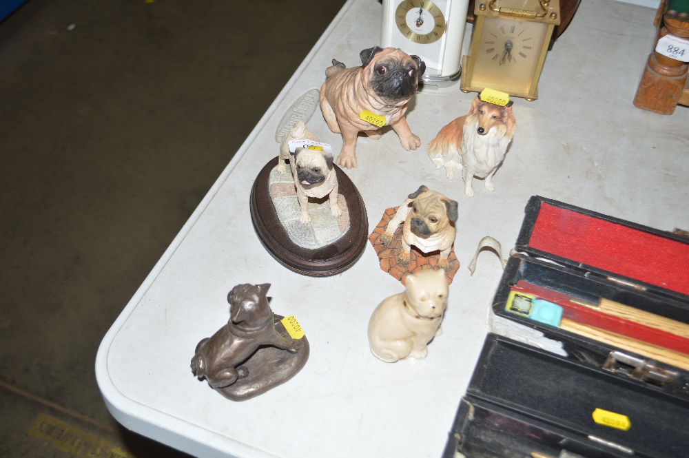 A quantity of pug ornaments etc.