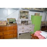 A painted mahogany dressing chest fitted two short