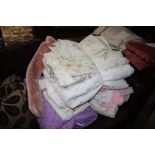 A quantity of various blankets, bed sheets, linen