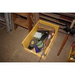 A box containing various pictures and prints; bras