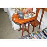 A reproduction mahogany side table