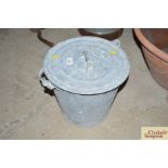 A galvanised egg bucket and lid