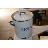 A vintage enamel bread bin