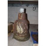 A vintage large cast iron water hopper of fluted d