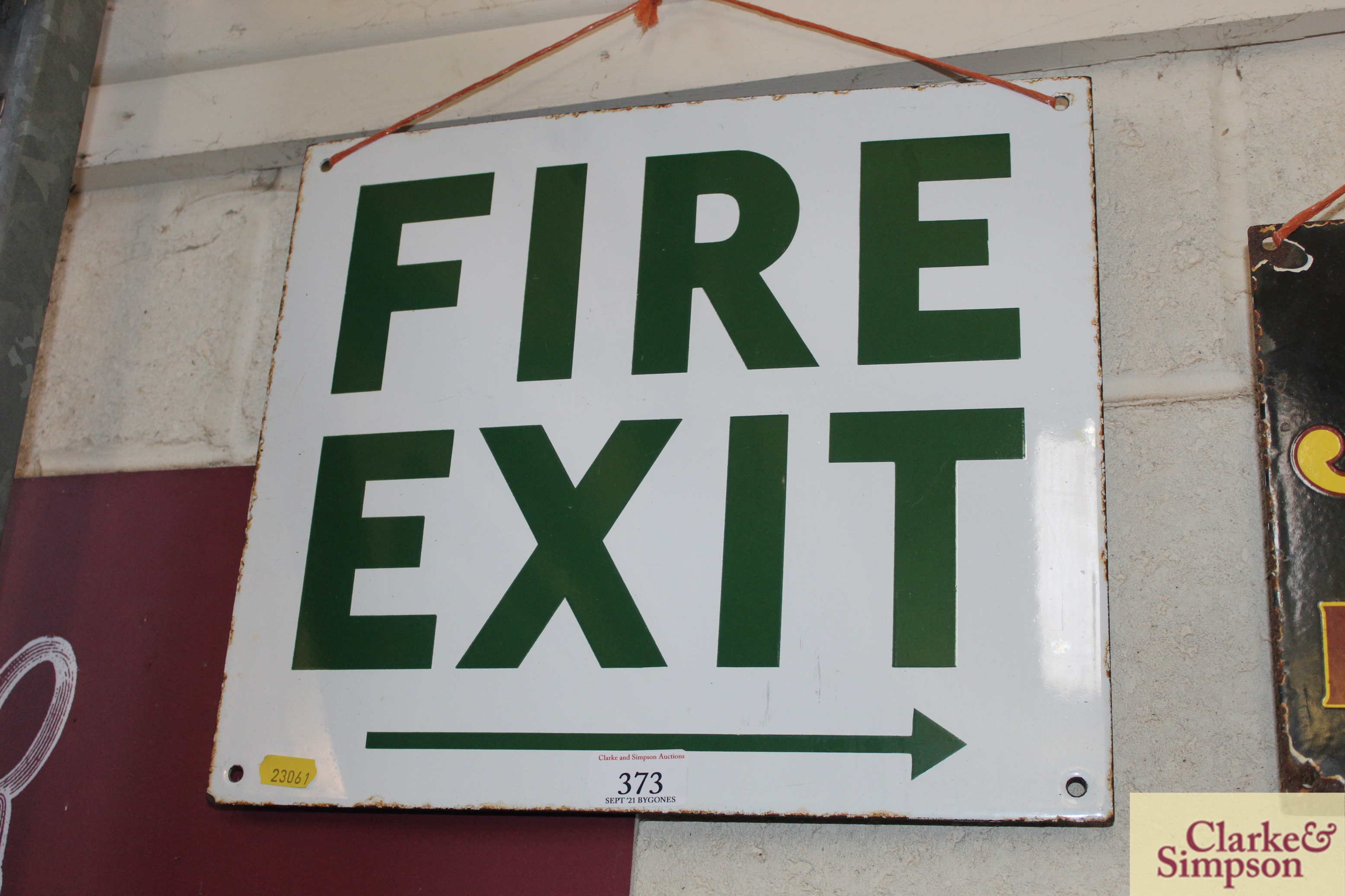 An enamel "Fire Exit" sign approx. 12" x 14"
