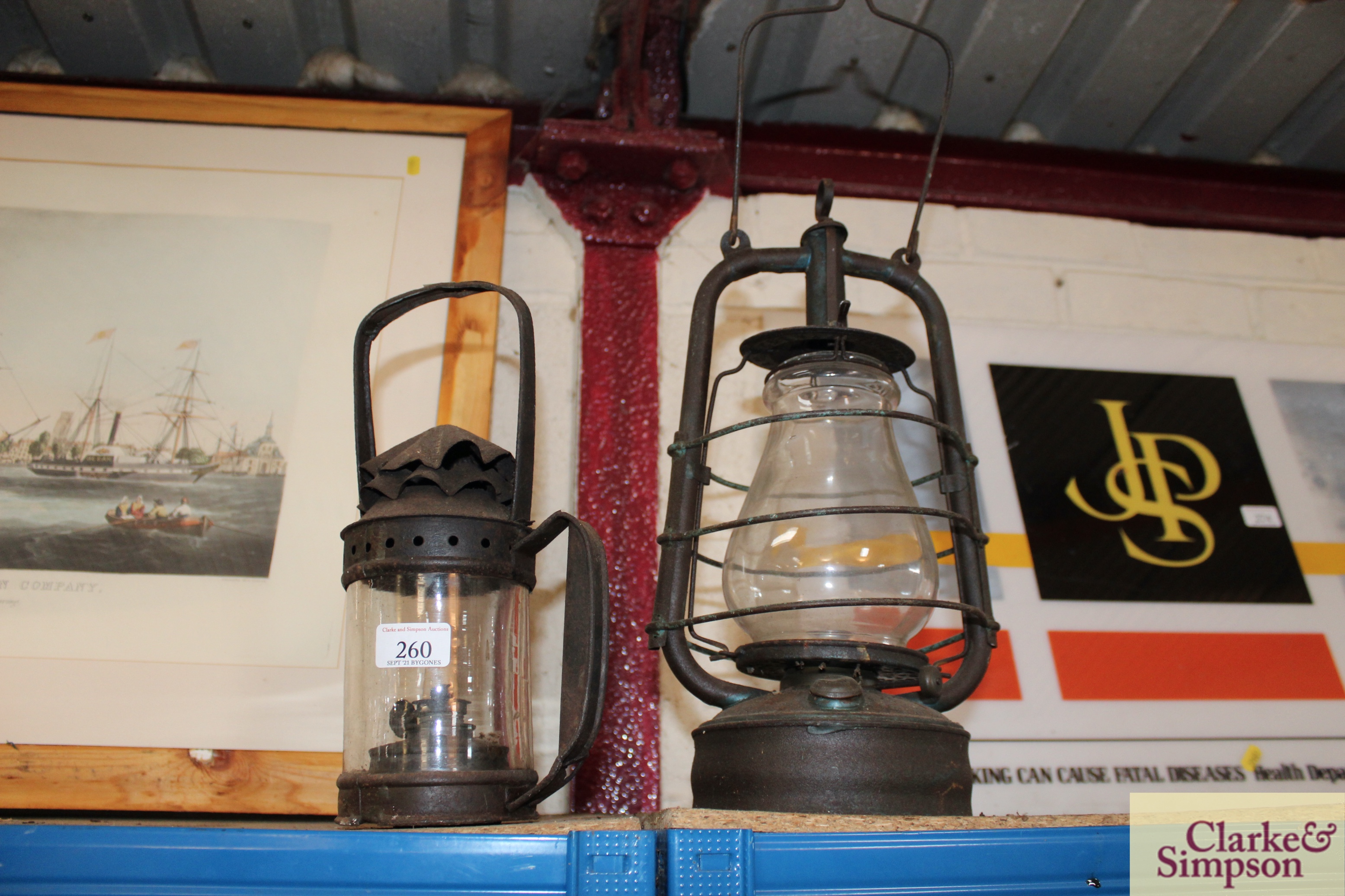 A vintage metal ware Hurricane lamp and a shepherds