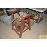 An old butter churn with stand and cream separator