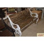 A cast metal and wooden slatted garden bench