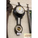 A banjo shaped clock / barometer / thermometer