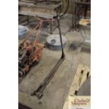 A vintage iron trolley jack