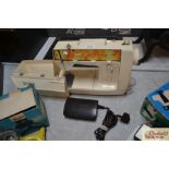A Singer Starlet sewing machine - sold as a collec
