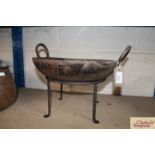 An iron Kadai on stand